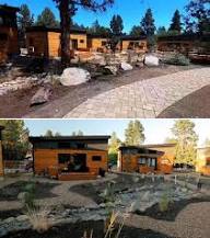 Tiny homes set among trees and stonework